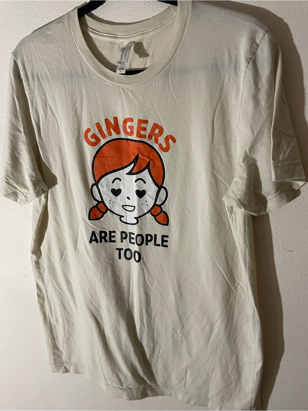 Bella Canvas Cream Graphic Tee with Orange Print
